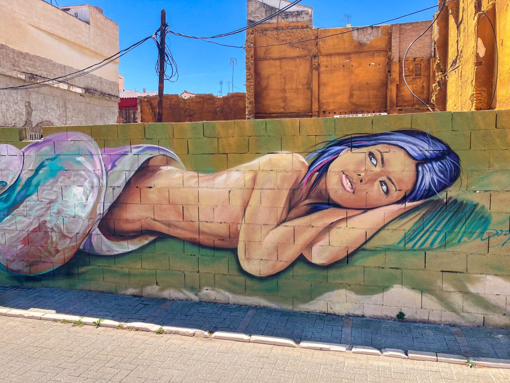 Street Art of sleeping girl in Málaga city