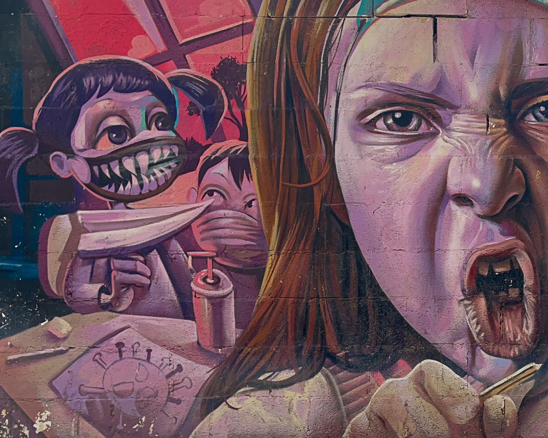 “Back To School” mural depicting an angry girl by Lalone in Málaga’s Lagunillas district