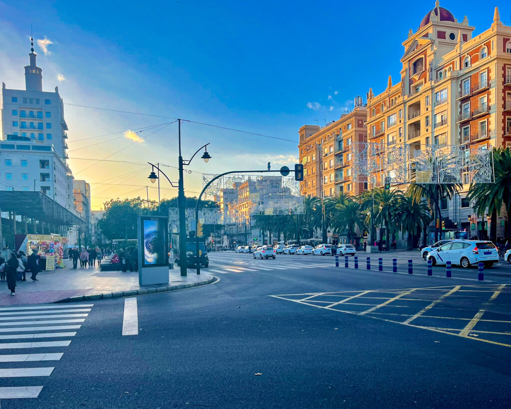 Alameda Principal in Málaga with the La Equitativa building on the left and neoclassical buildings on the right