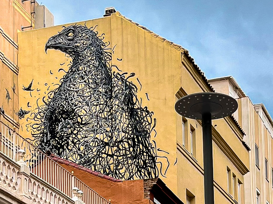 Bird mural by Chinese artist Dal East in Málaga’s Soho neighbourhood, viewed from Alameda Principal
