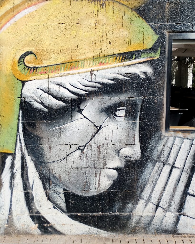 Mural of ancient Greek woman by Lalone in Málaga