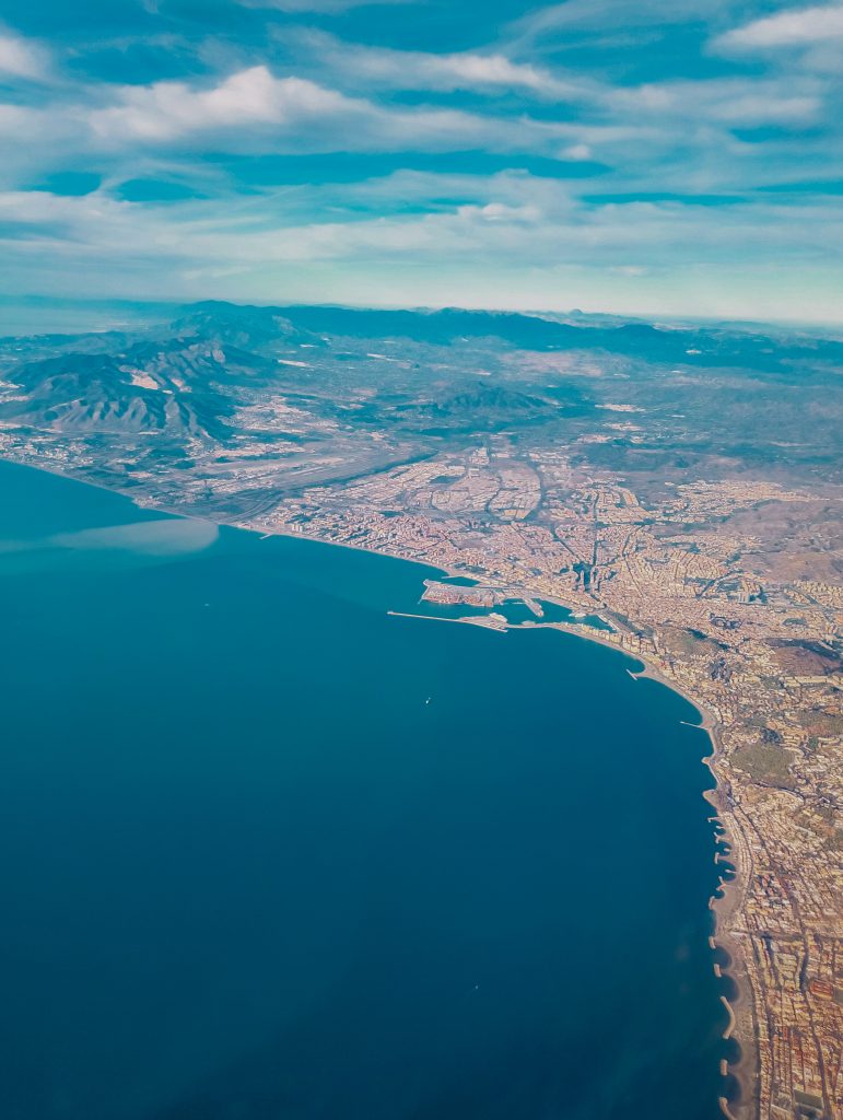 Aerial view of Málaga coast and the port of Málaga, shot from an airplane descending to the airport Málaga-Costa Del Sol