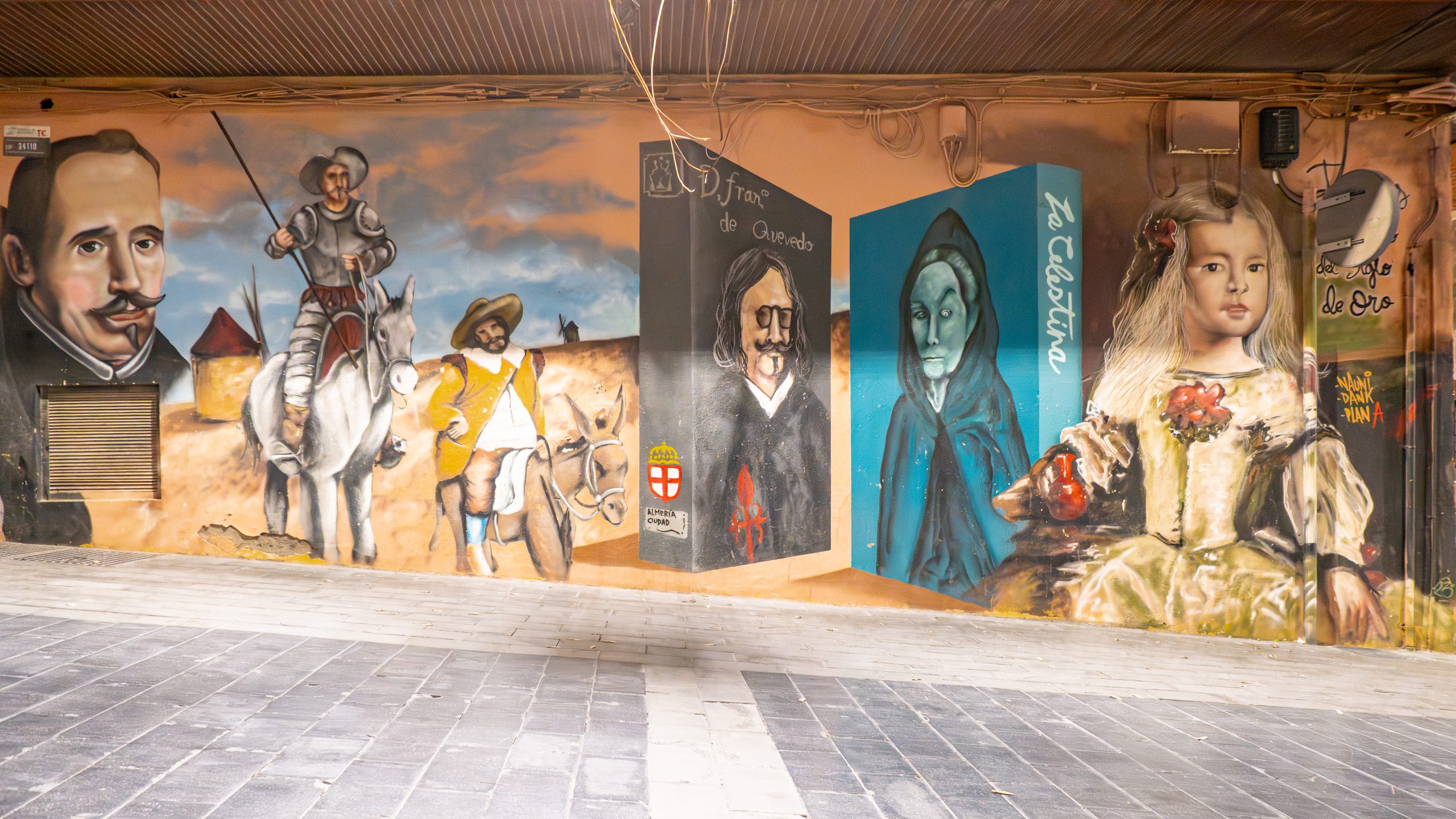 Mural "Jornadas de Teatro del Siglo de Oro" by Dank and Nauni in the Mural en calle Martínez Almagro in Almería