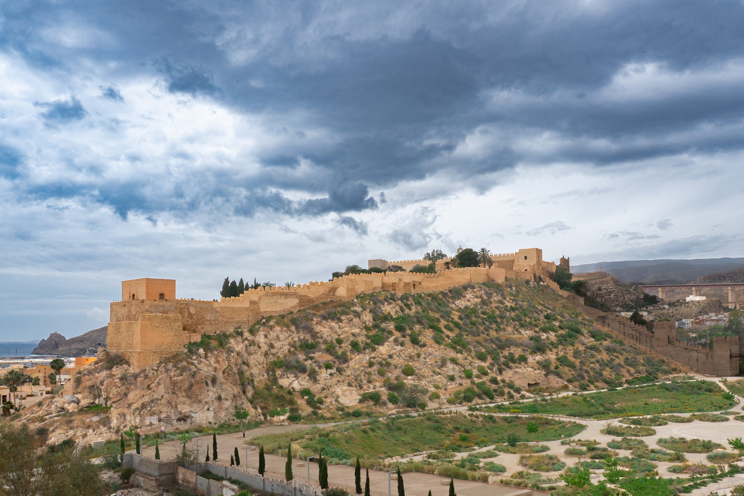 The Alcazaba of Almería with dark clouds above