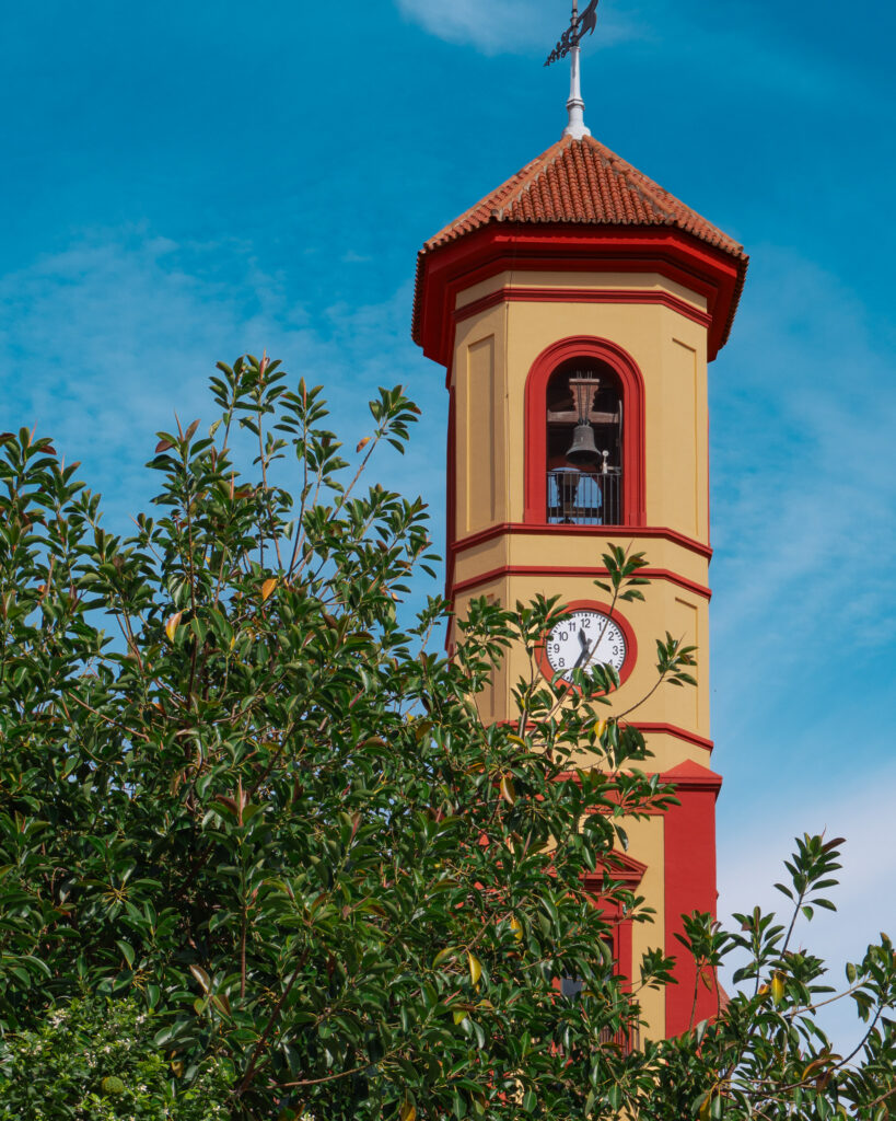 Tower of the San José Obrero church on Calle Virgen de las Nieves in in Málaga's Cruz de Humilladero district
