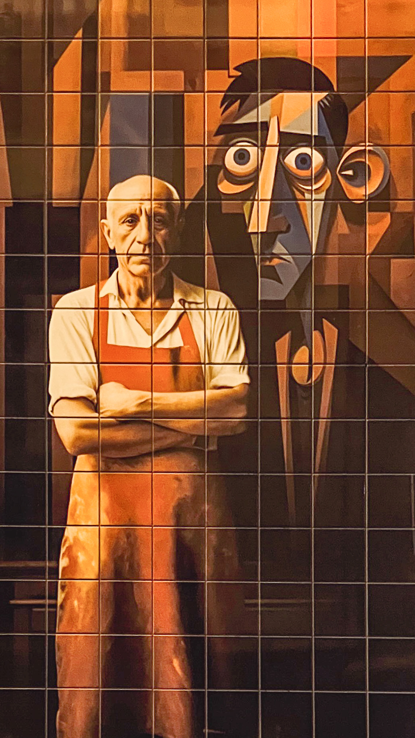 Tile art depicting Pablo Picasso and his work on the façade of the Picasso restaurant. It is located in Plaza de la Merced, in Málaga's historic center