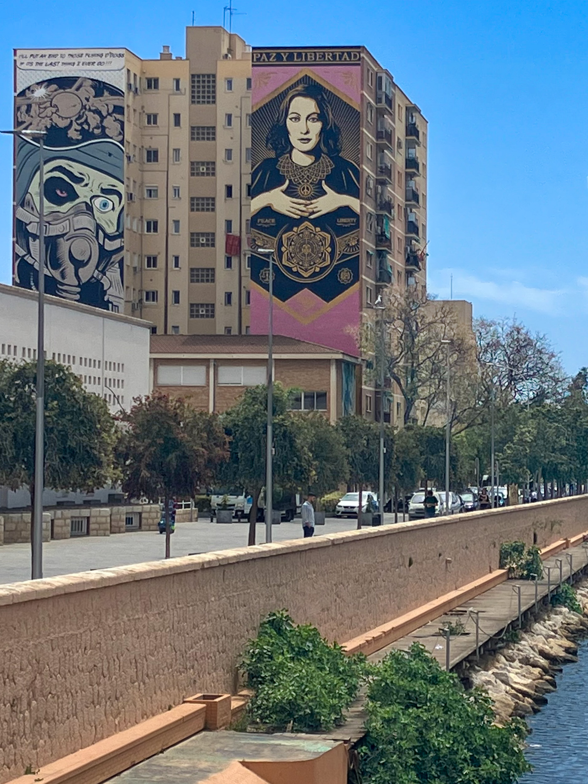 Street Art "Cerrado por Malagueña" by D*Face and Paz Y Libertad from Shepard Fairey (OBEY) next to the Guadalmedina river in Málaga, on Avenida del Comandante Benítez. It was part of the "MAUS 2013" project (Málaga Arte Urbano Soho)