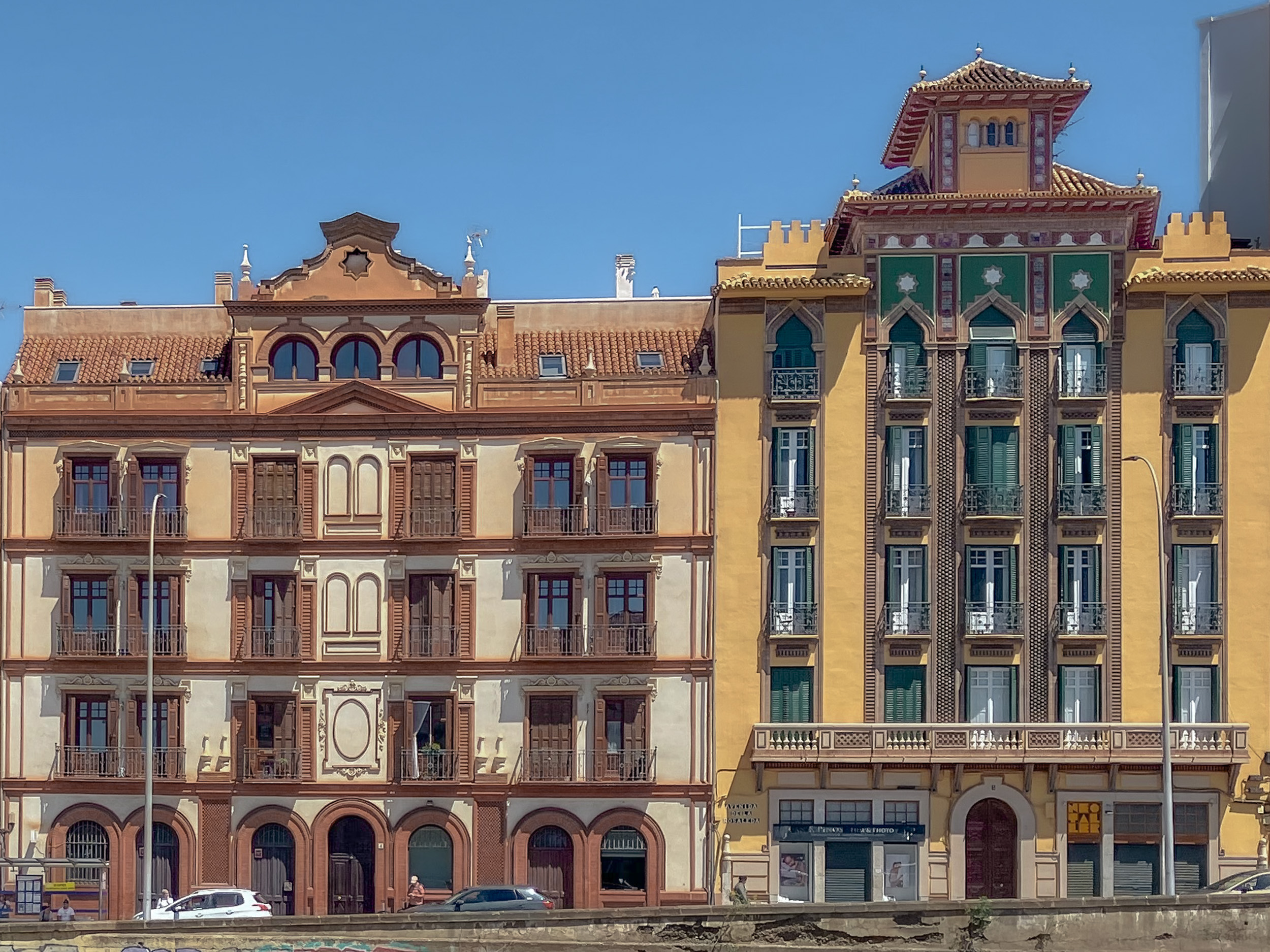 Historic apartment buildings in Neo-Mudéjar and Art Deco styles, located on Avenida de la Rosaleda in Málaga's historic center, next to the Guadalmedina River